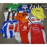 Nine vintage football shirts