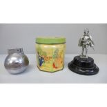 A silver plated model of Sir Walter Raleigh, a table lighter and a Cinderella toffee tin
