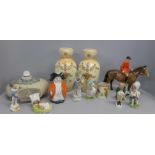 A collection of figures and a pair of Crown Devon vases and a Royal Doulton hot water bottle