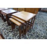 A Stonehill Stateroom teak nest of tables