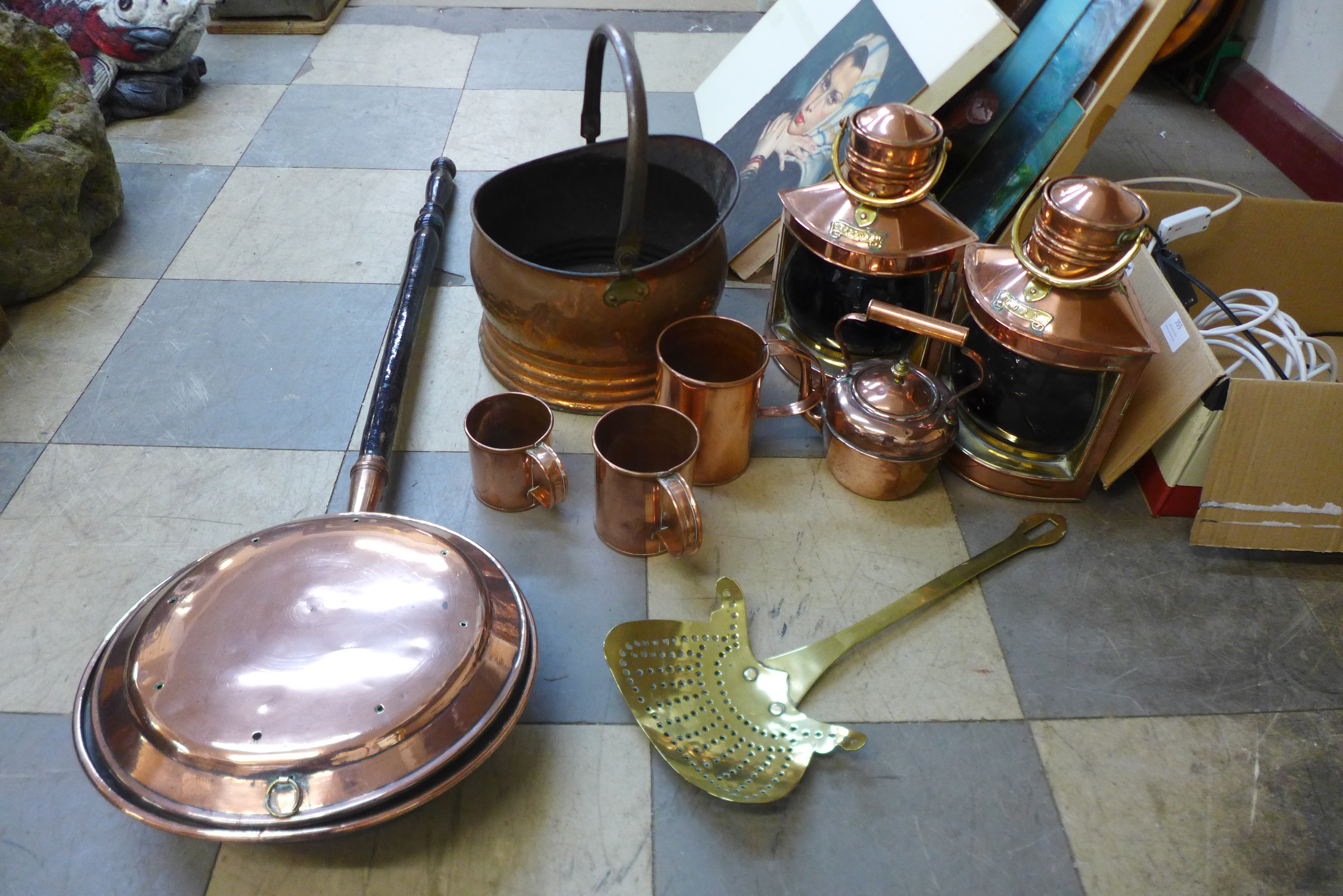 A collection of metalware including a set of measuring cups, chestnut roaster, coal scuttle, bed