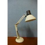 A white metal anglepoise desk lamp