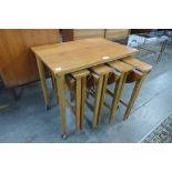 A Danish Poul Hundevad teak nest of tables