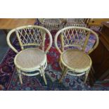 A pair of bamboo chairs