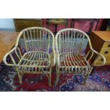 A pair of bamboo chairs