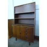 A Herbert Gibbs tola wood bookcase