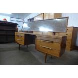 A White & Newton teak dressing table and matching bedside cabinets