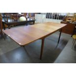 A McIntosh teak T3 extending dining table