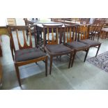 A set of four G-Plan Brasilia teak dining chairs