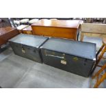 A pair of vintage steamer trunks