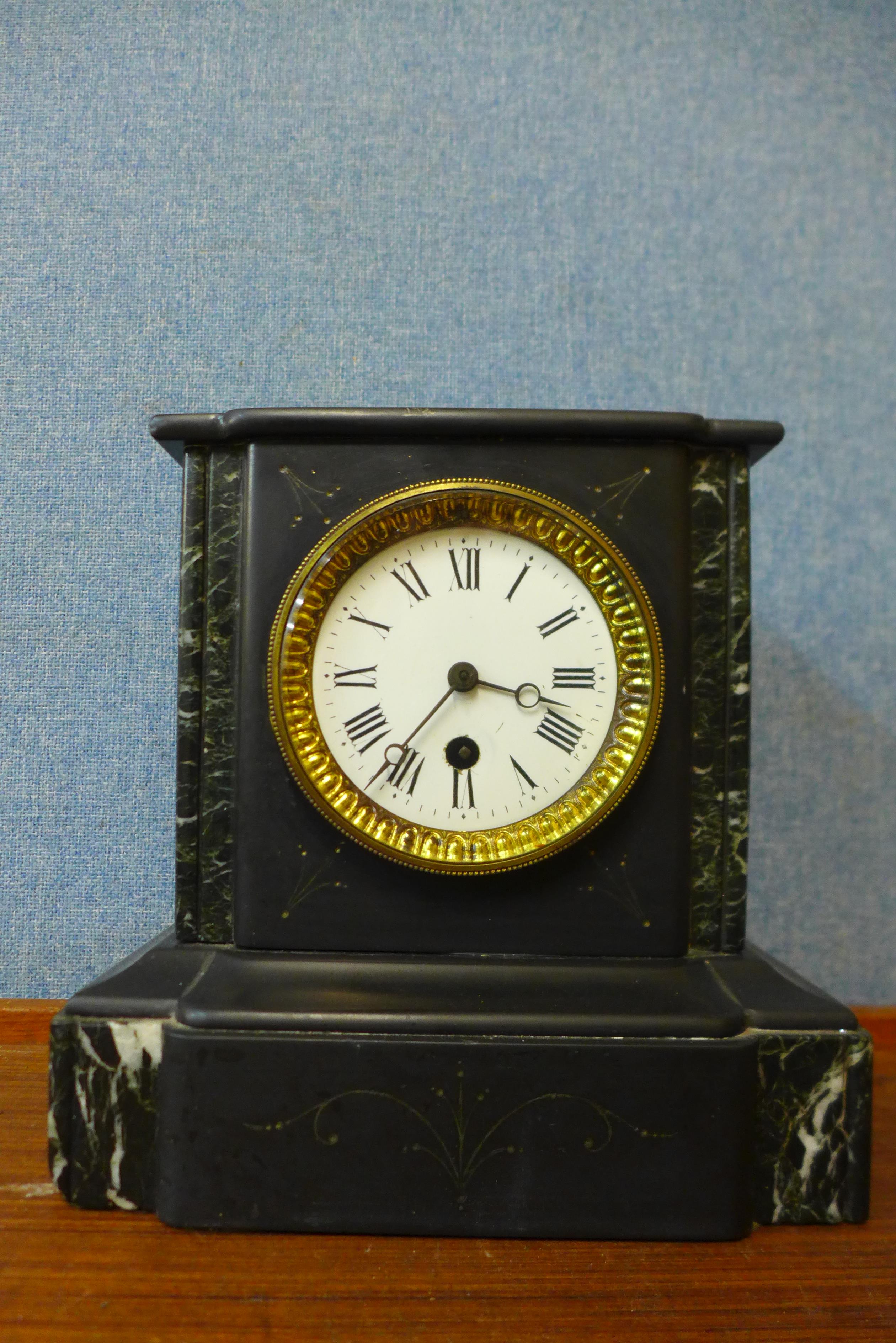 A 19th Century French Belge noir mantel clock