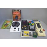 A collection of electronic games including Space Invaders, Donkey Kong Hockey and Pocket Simon