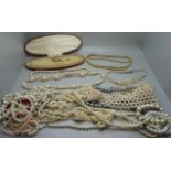 Five strings of faux pearls with silver clasps, two pairs of earrings and a bag of faux pearls