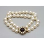 A two row pearl bracelet with a 9ct gold clasp