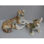 Two USSR figures, tiger and cub
