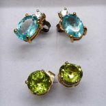 Two pairs of 9ct gold, peridot and aquamarine ear studs, 2.2g