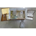 Three glass decanters, four glass paperweights, plated fish knives, etc. **PLEASE NOTE THIS LOT IS
