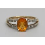 A 9ct gold, fire opal and diamond ring, 2.8g, P