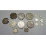 A Victorian double florin, 1887, a George IIII 1821 crown, two 1935 crowns and other coins