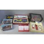 A collection of Corgi and Minichamps model vehicles, boxed