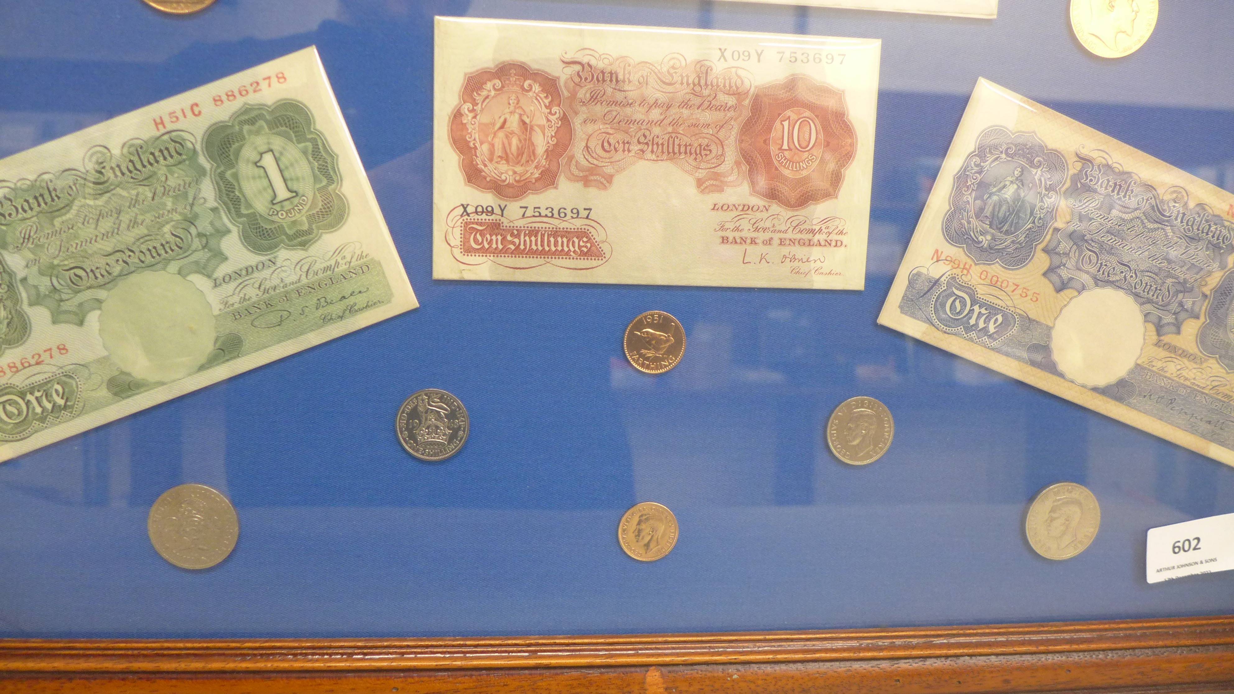 A framed Five Pounds white bank note, two £1 notes, ten shillings note and other coins - Image 3 of 4