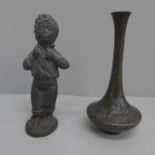 A cast bronze figure of a boy and a Chinese style bronze vase