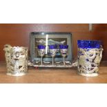 A Chinese pewter and glass drinks set, comprising six goblets with blue glass liner, two large mugs,
