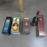 Four bottles of brandy including Delemaine cognac, Courvoisier and Martel