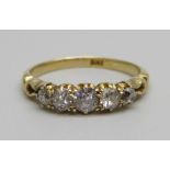 An 18ct gold and five stone diamond ring, 2.7g, O