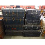 Five steel trunks, three steamer trunks and a suitcase