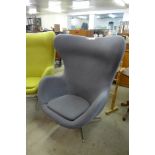 An Arne Jacobsen style chrome and grey fabric revolving egg chair