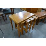 A Poul Hundevad teak nest of tables