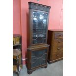 An Edward VII Chippendale Revival mahogany freestanding corner cabinet