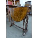 A Victorian figured walnut bobbin turned Sutherland table