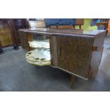 A simulated walnut cocktail sideboard