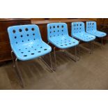 A set of four Robin Day Design chrome and blue Perspex Loft chairs