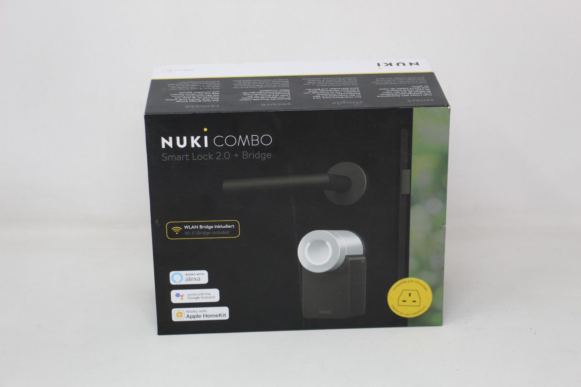 A boxed as new Nuki Combo Smart lock 2.0 + Bridge (Compatible with UK sockets).