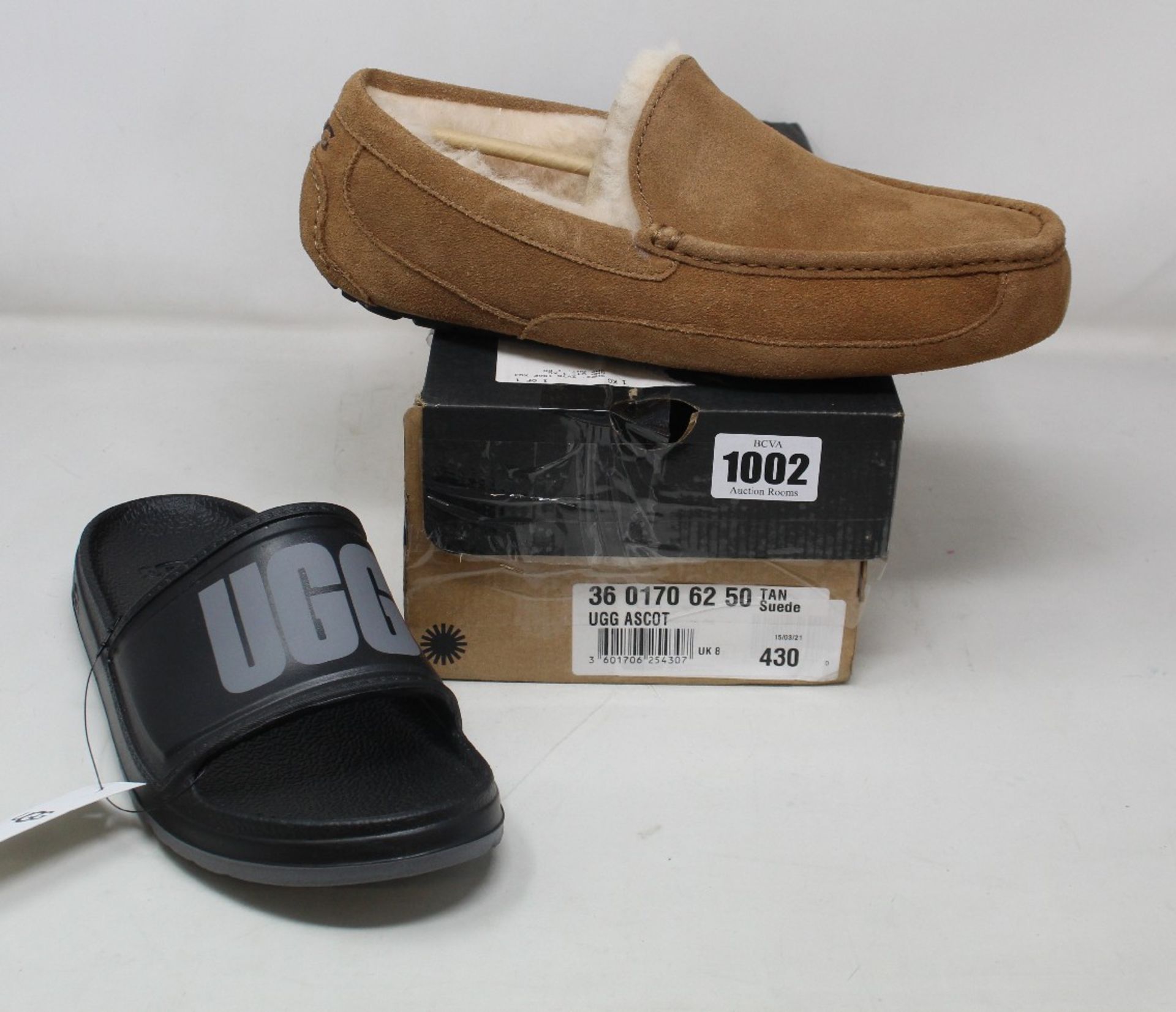 A pair of as new Ugg Ascot slippers (UK 8) and a pair of Ugg Wilcox slide (UK 6).