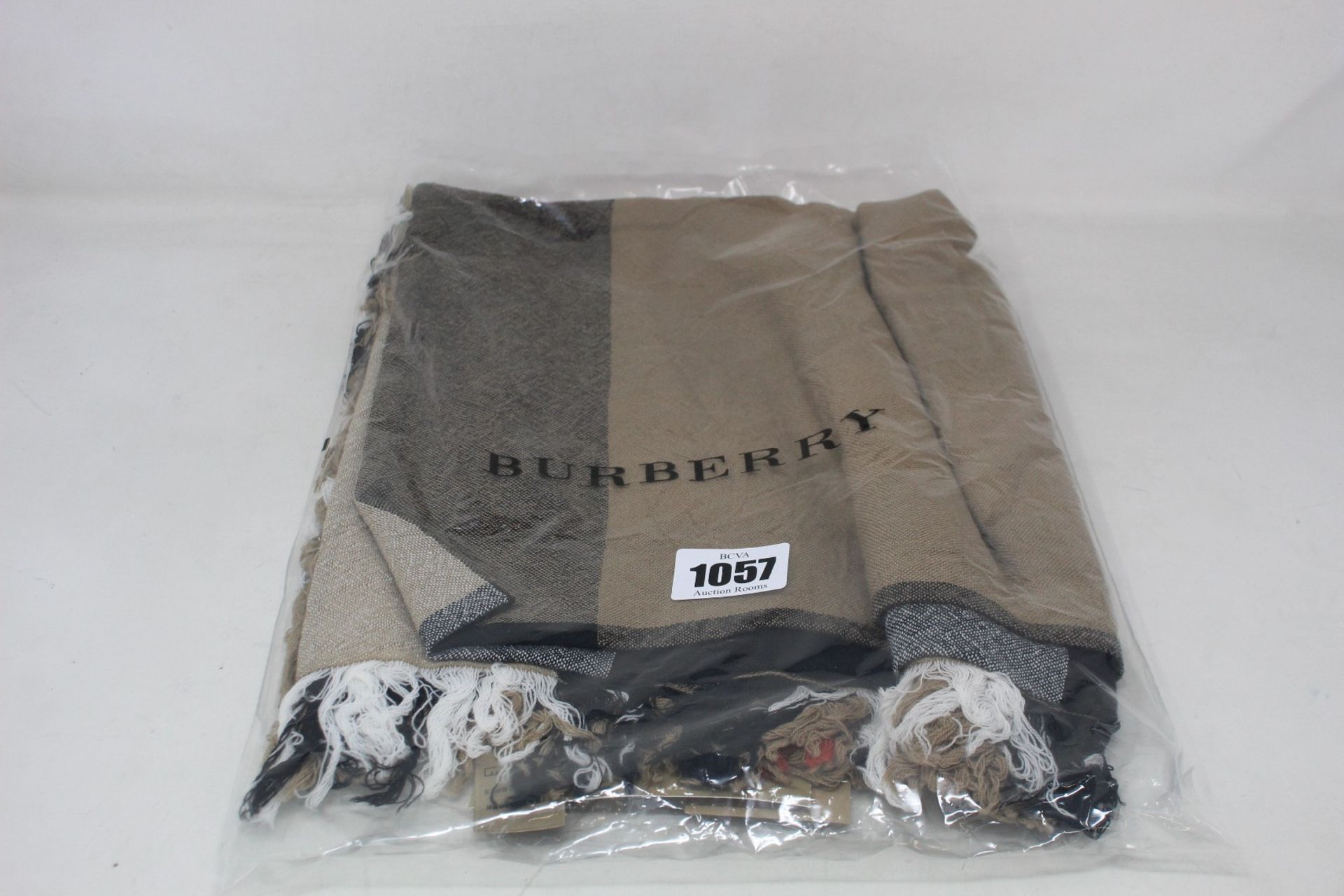 An as new Burberry House Check scarf.