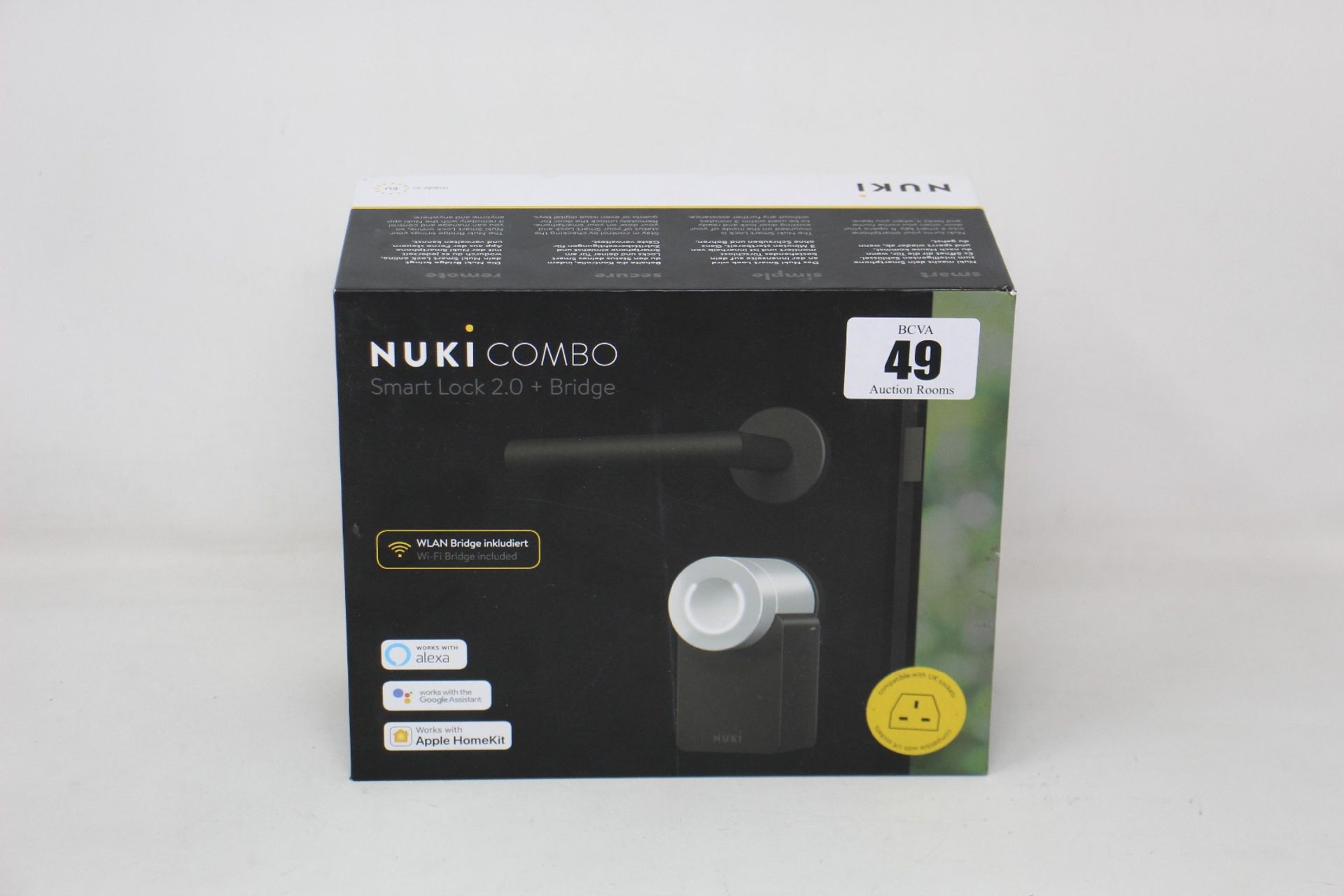 A boxed as new Nuki Combo Smart lock 2.0 + Bridge (Compatible with UK sockets).