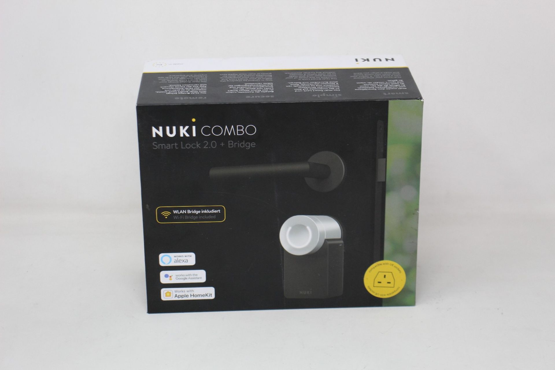 A boxed as new Nuki Combo Smart lock 2.0 + Bridge (Compatible with UK sockets).