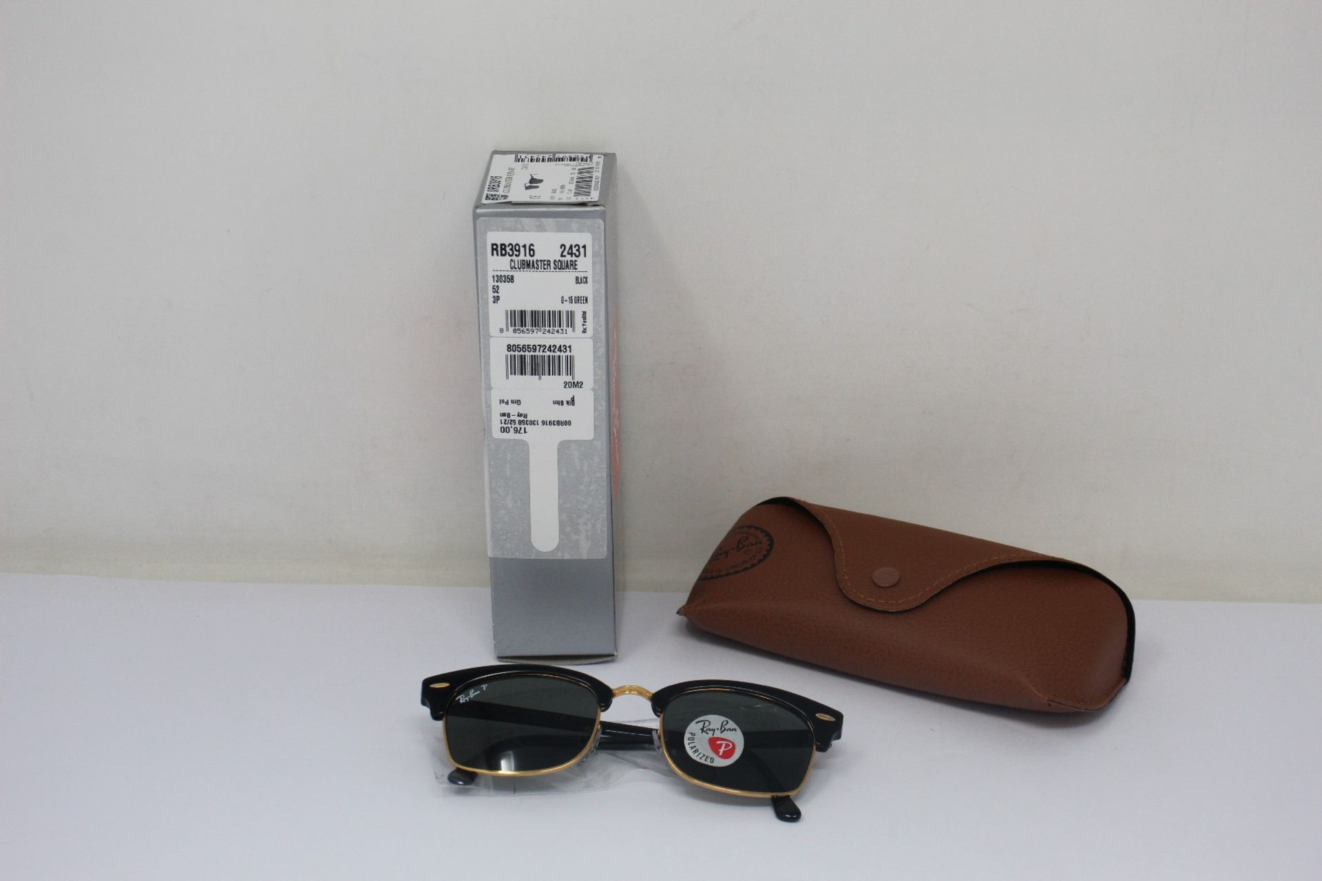 A pair of as new Ray Ban Clubmaster Square sunglasses.