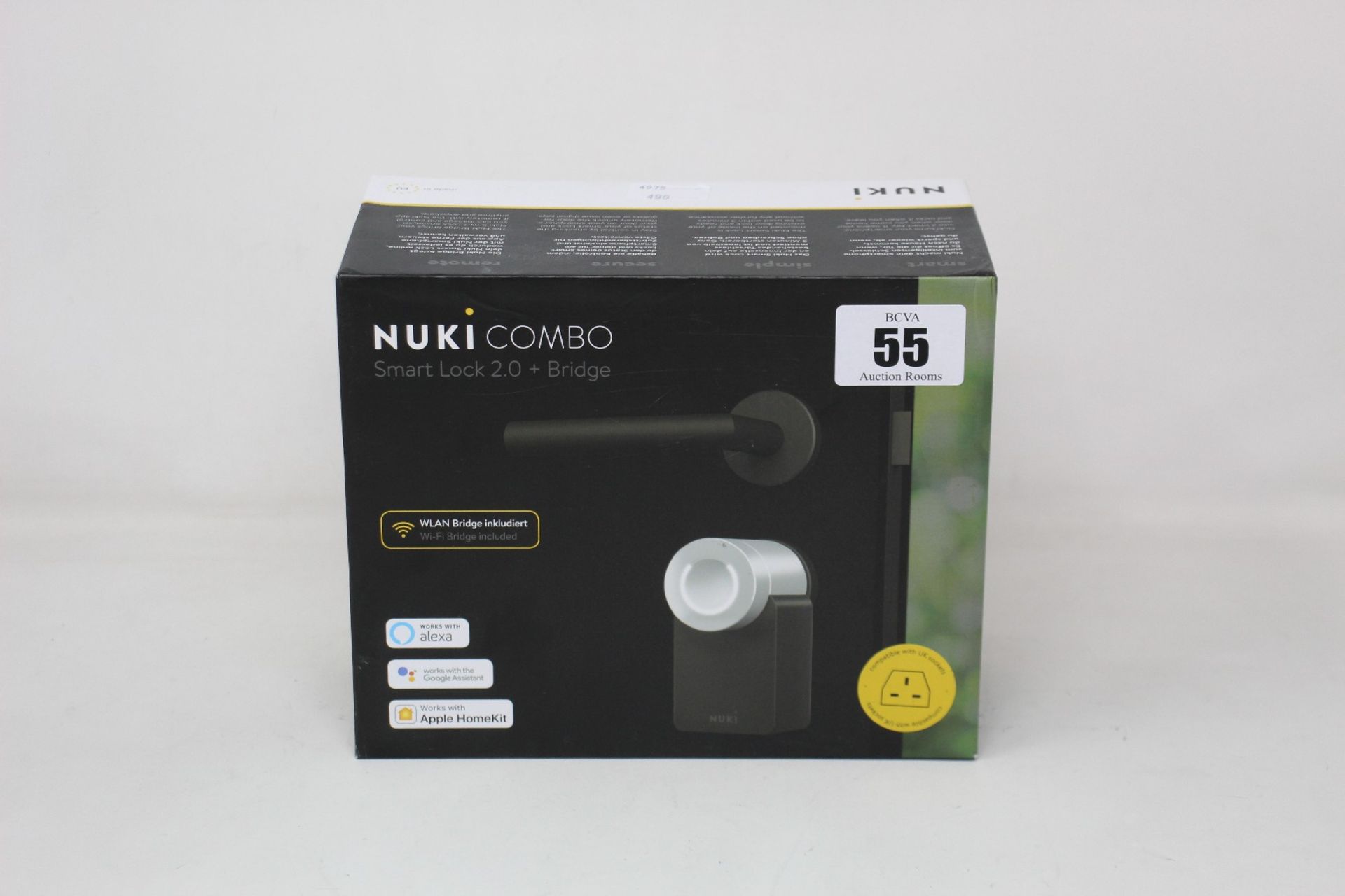 A boxed as new Nuki Combo Smart lock 2.0 + Bridge (Compatible with UK sockets).