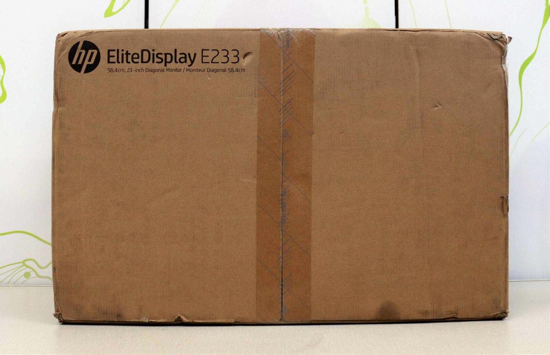 A boxed as new HP EliteDisplay E233 23" HD IPS monitor in silver (box opened) (box damaged).