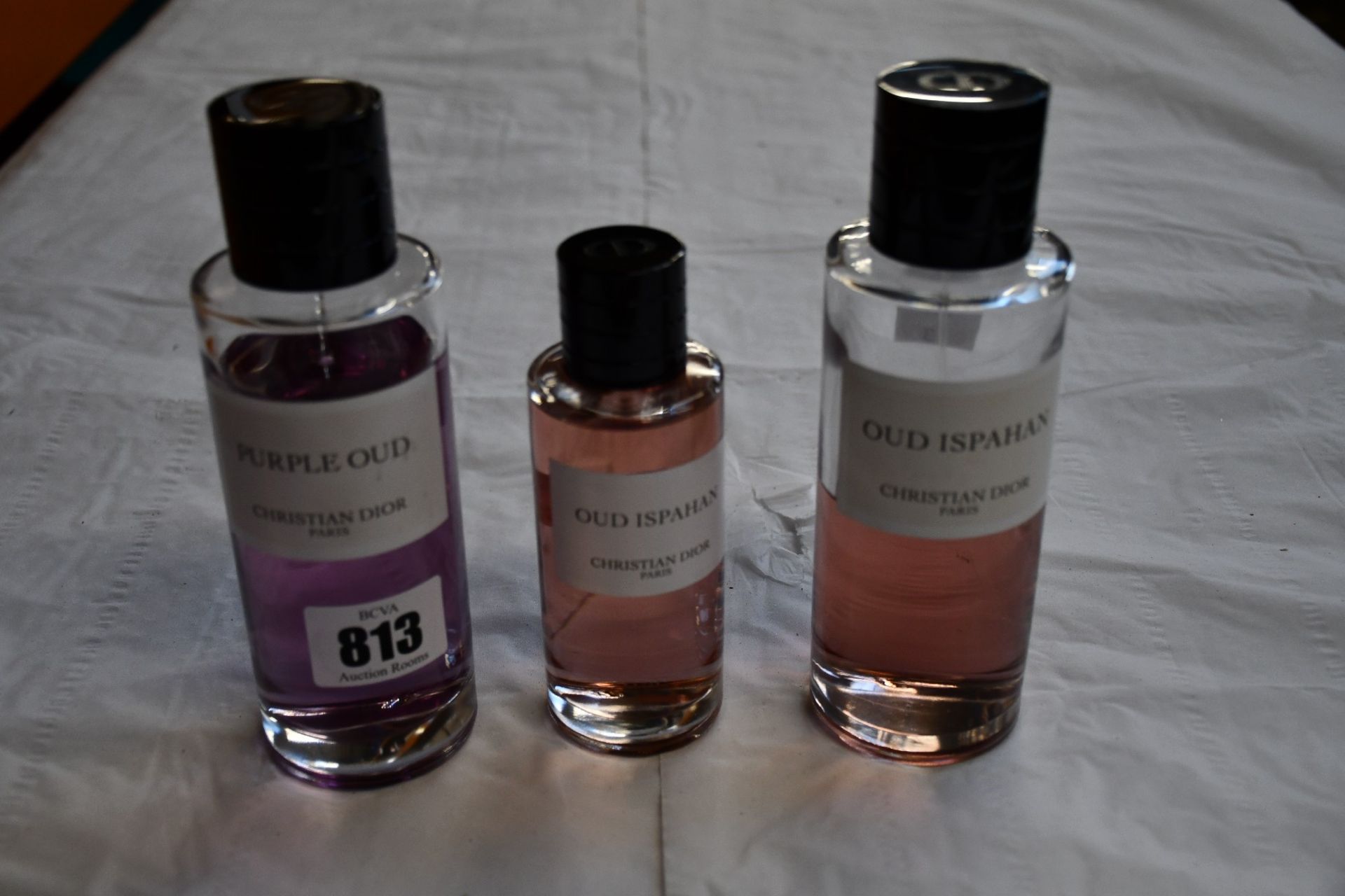 A part used Christian Dior Purple Oud eau de parfum (250ml) and two part used Christian Dior Ispahan