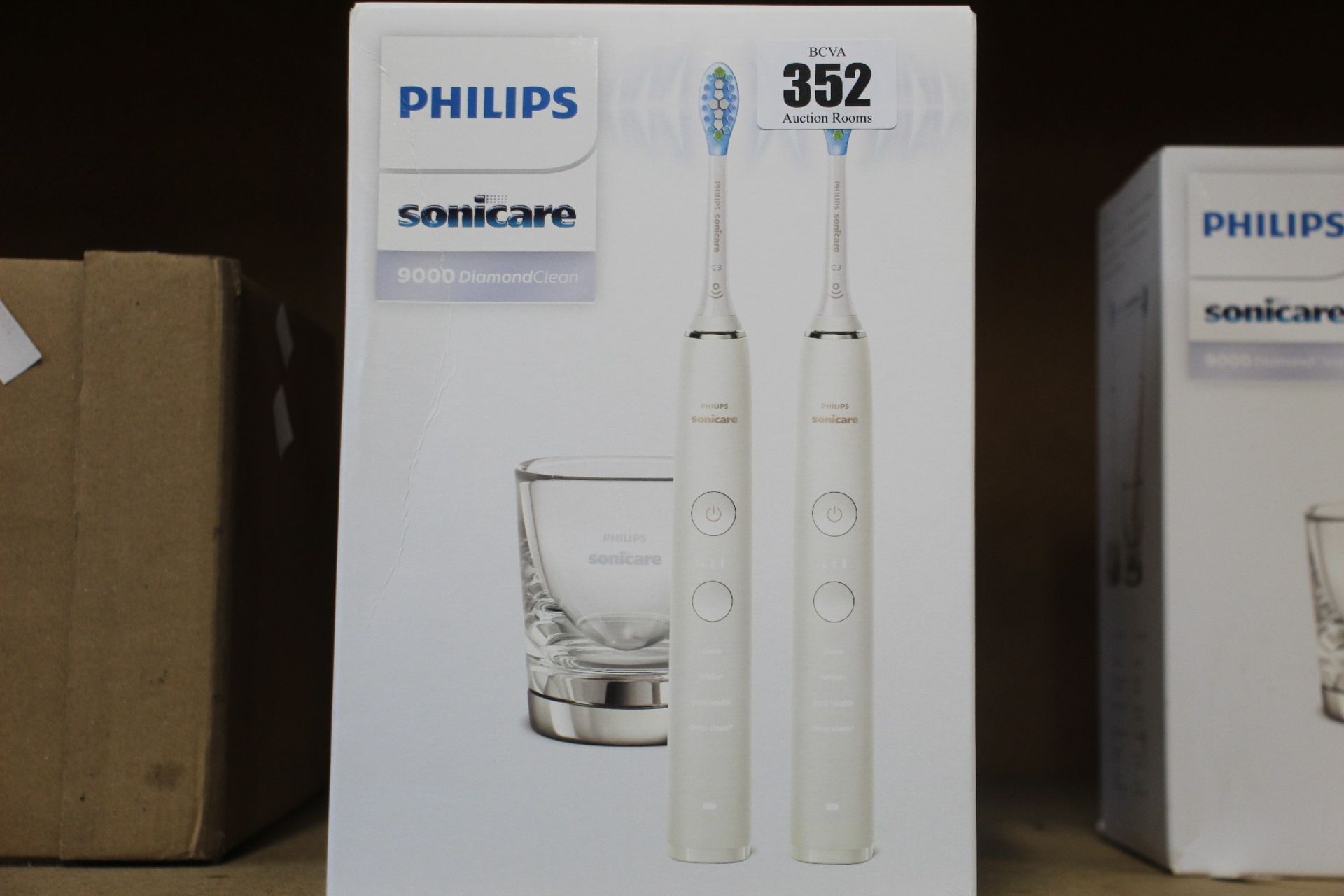 A boxed as new Philips Sonicare DiamondClean 9000 Set of 2 White Electric Toothbrushes.