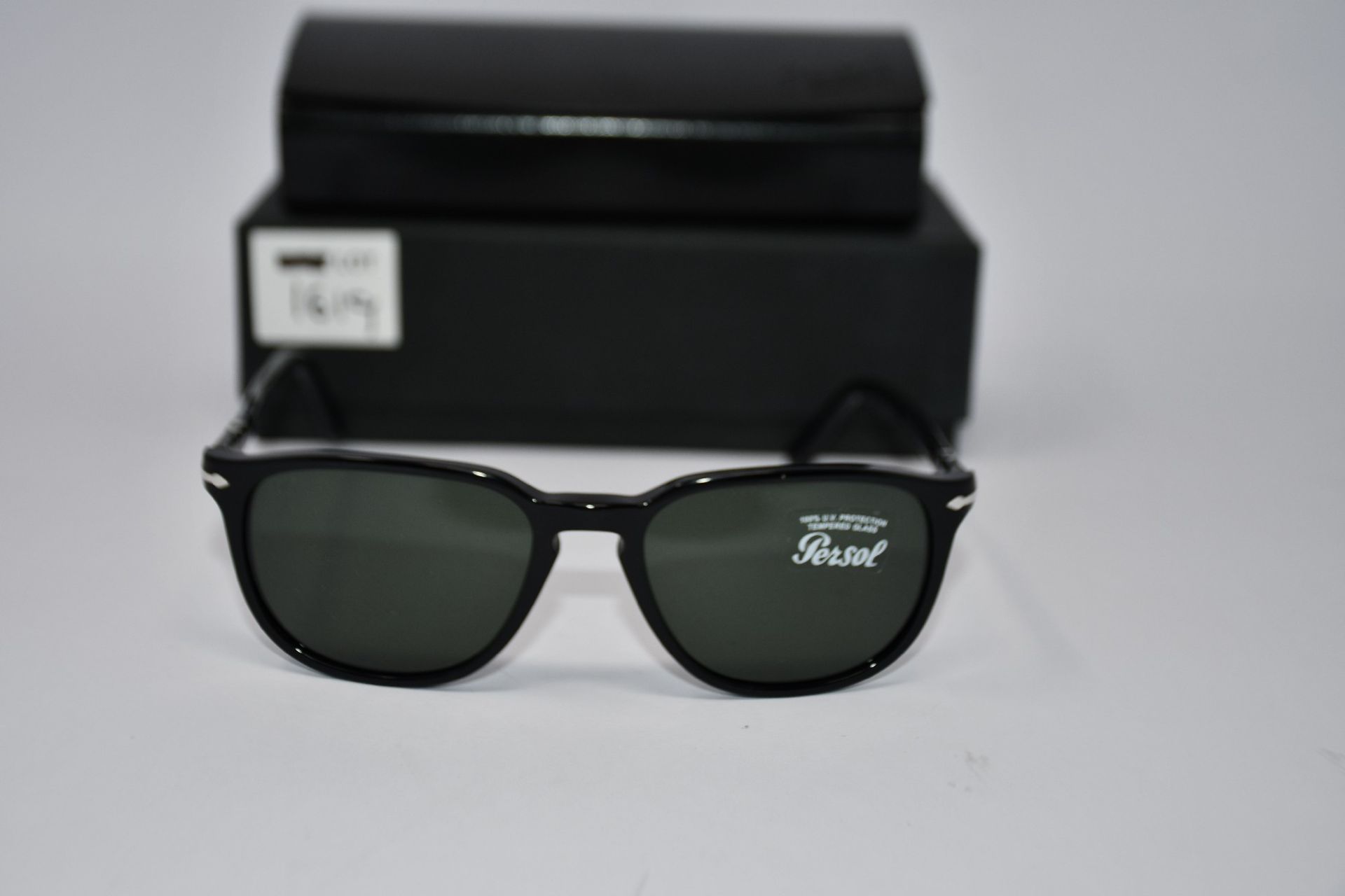 A pair of as new Persol PO3019S sunglasses.