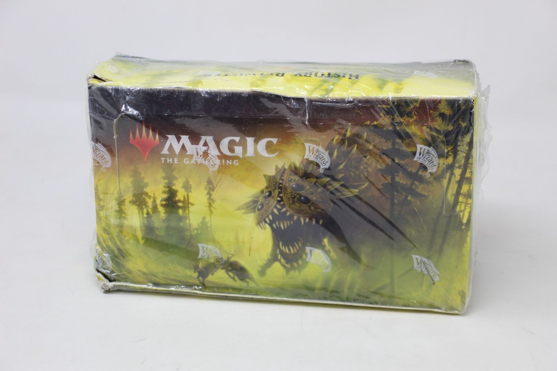 A MTG TCG Time Spiral draft booster box (Box is sealed but seal is loose, box has some minor