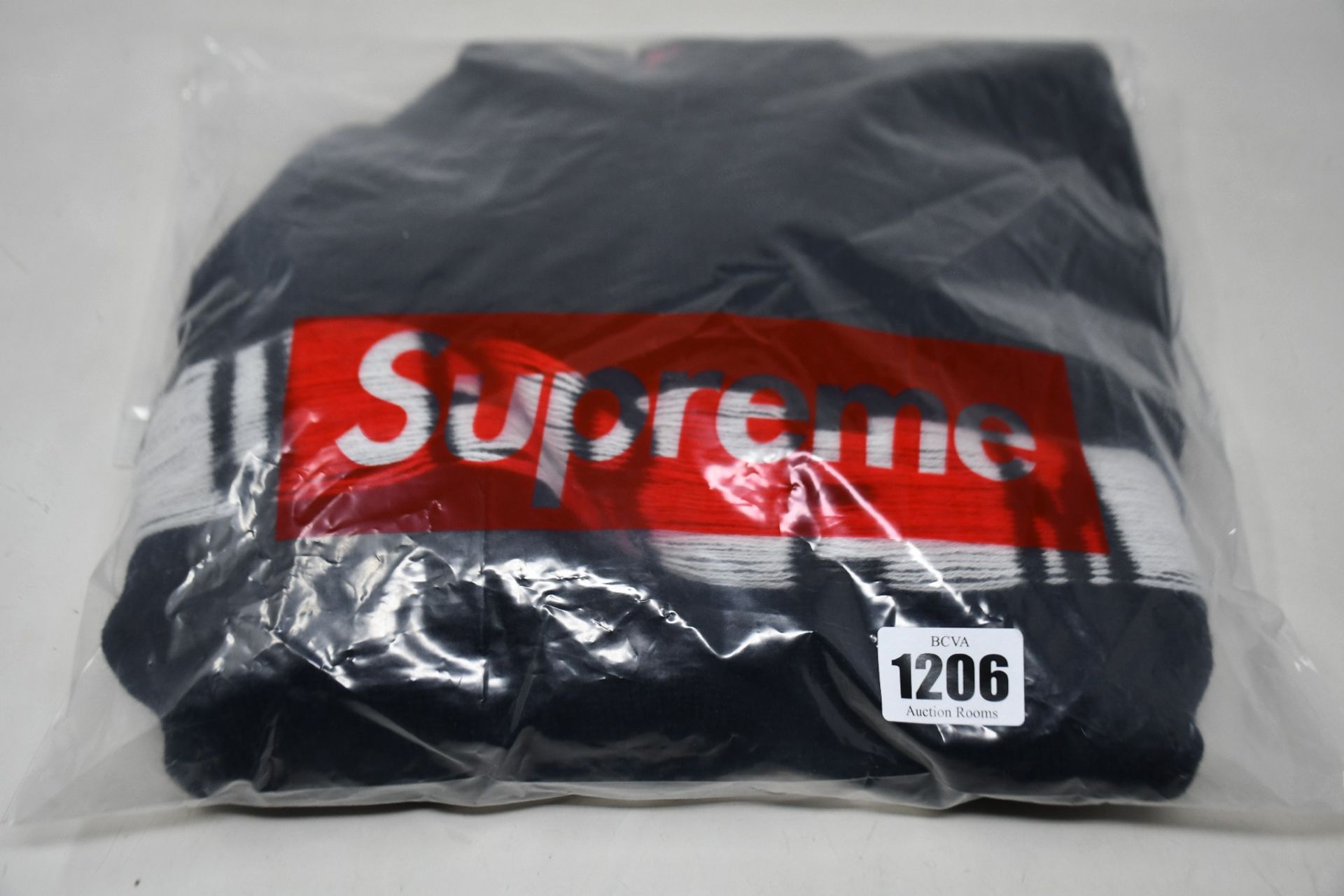 An as new Supreme Inside Out Logo sweater (M).
