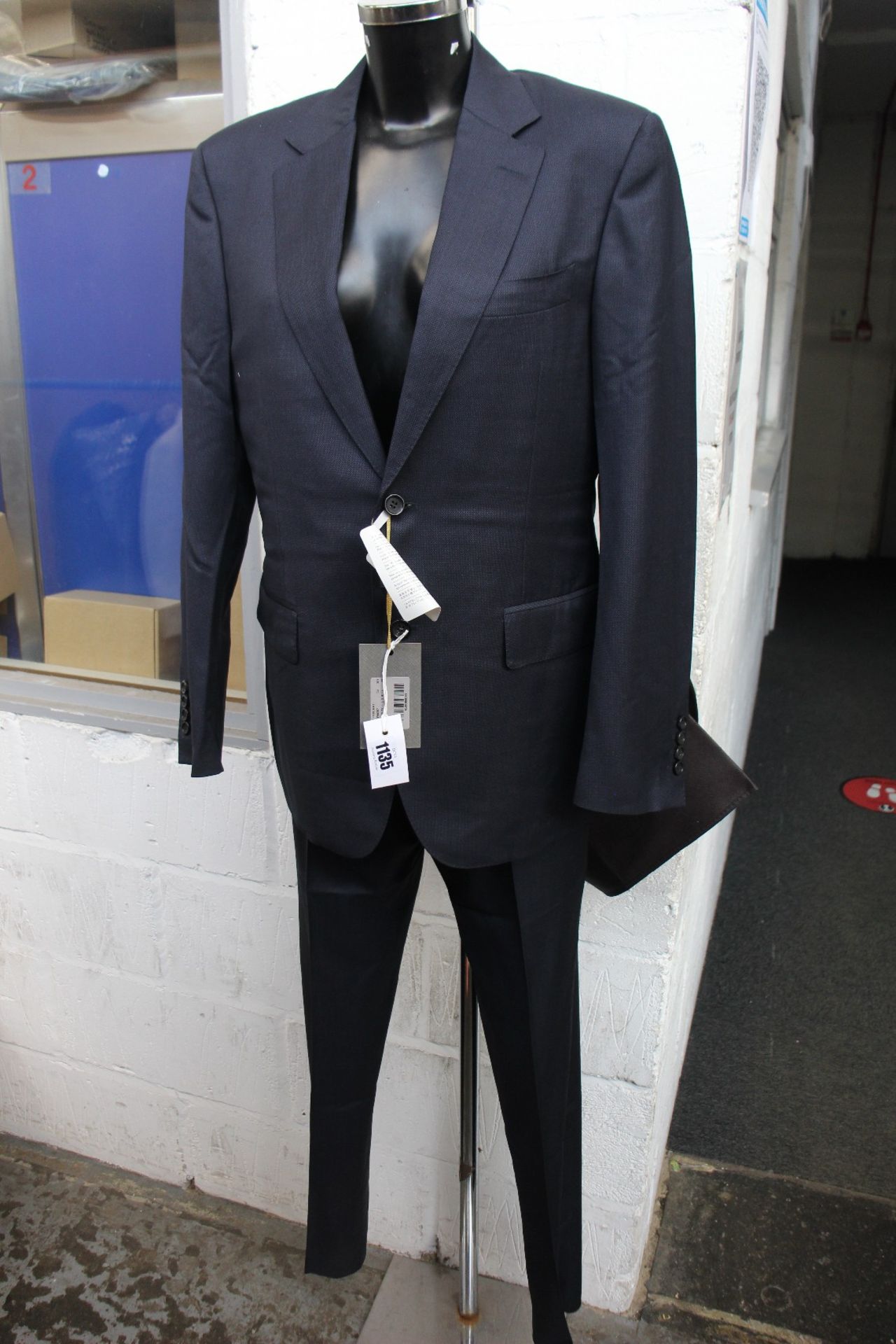 An as new Canali lined suit (Size 48? - RRP £945).